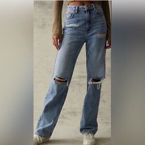 NWT PacSun Light Blue Ripped
Boyfriend Jeans